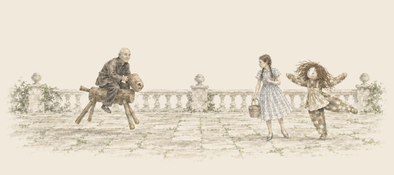 The Wizard rides the Sawhorse at a gallop into a paved courtyard toward Dorothy, while the Patchwork Girl dances with her arms flung out.