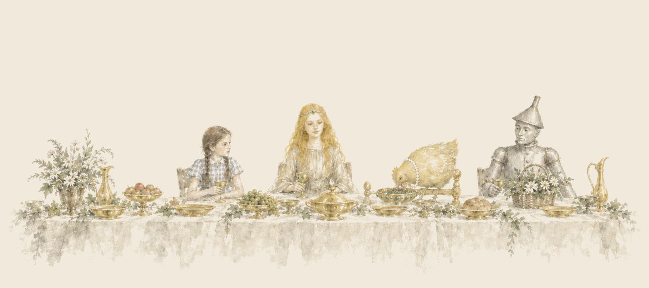 Dorothy, Ozma, Billina on a little golden roost, and the Tin Woodman sit along a feast table set with golden dishes, flowers and fruit.