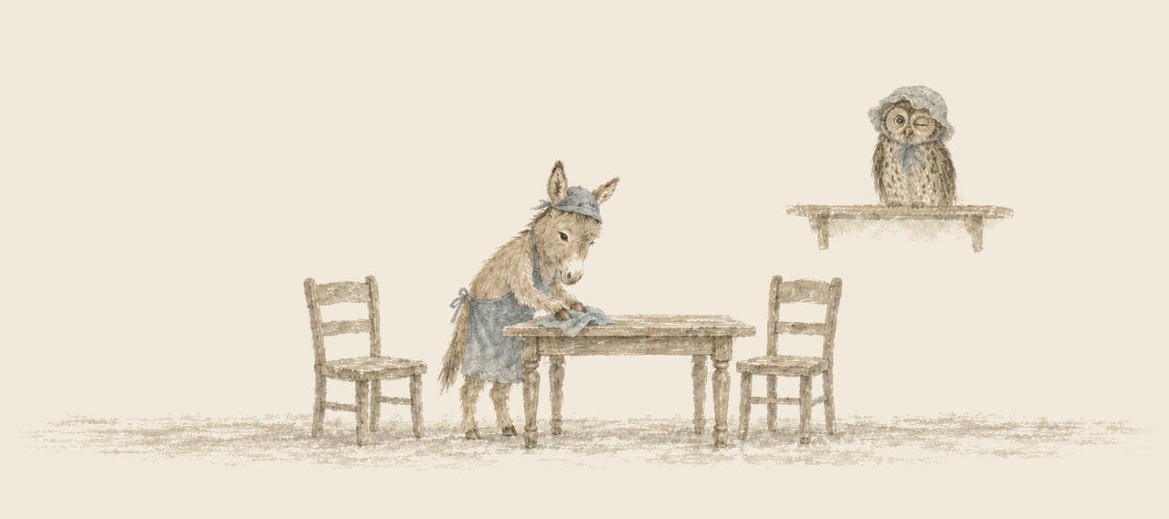 A little donkey in an apron and cap dusts a table between two chairs, while a blue owl in a bonnet watches from a shelf.