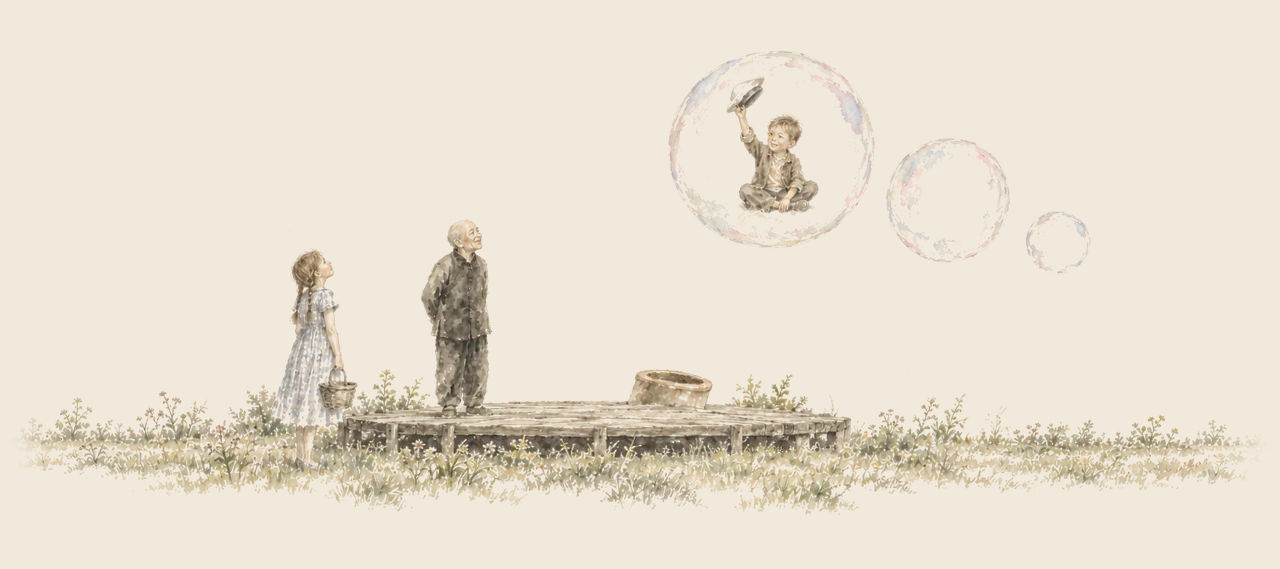 Dorothy and the Wizard look up from a wooden platform at Button-Bright, who sits in a big soap bubble waving his hat, with two smaller bubbles beyond.