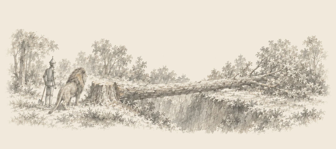 The Tin Woodman and the Cowardly Lion stand at the edge of a deep ditch, a felled tree lying across it as a bridge.